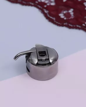 Шпульный колпачок к БШМ (левый) 3х2,5х1,5см арт. ИШВ-62-1-47465